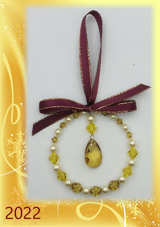 A TRADITION OF CRYSTAL WREATH ORNAMENTS