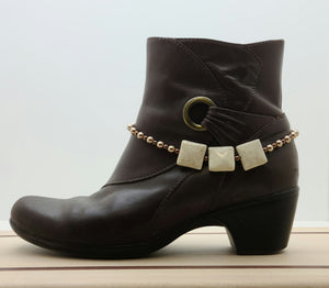 Every step will sparkle when you dress up your boots &amp; booties with the bling in this boot bracelet featuring river stone, electroplated hematite, &amp; bronze crystal pearls