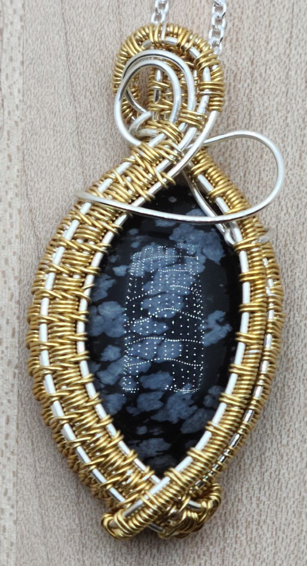 silver and gold framed snowflake obsidian woven wire pendant