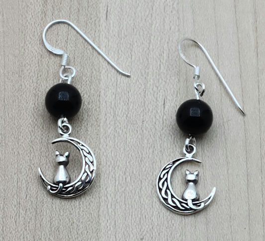 Add some fun to your accessory game with these Sterling Silver Cat & Moon fish hook Earrings.