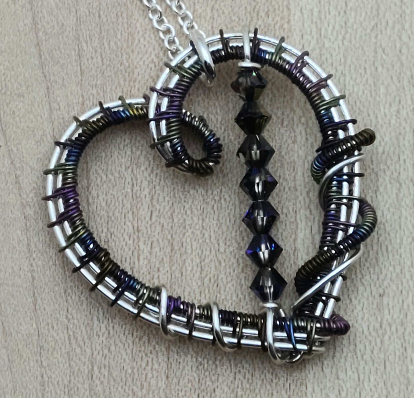 Woven Wire Peacock Niobium Heart with crystals