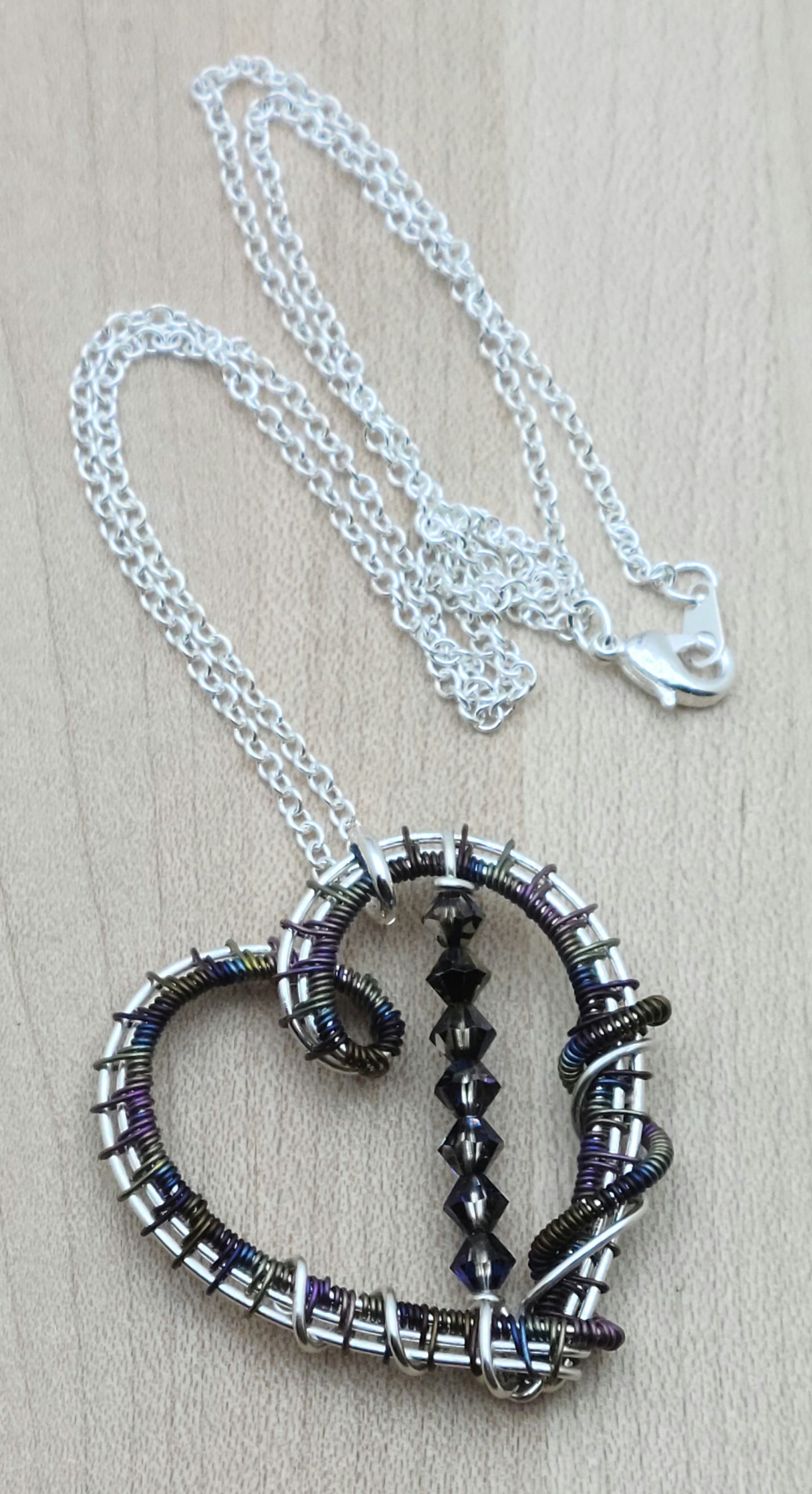 Woven Wire Peacock Niobium Heart with crystals