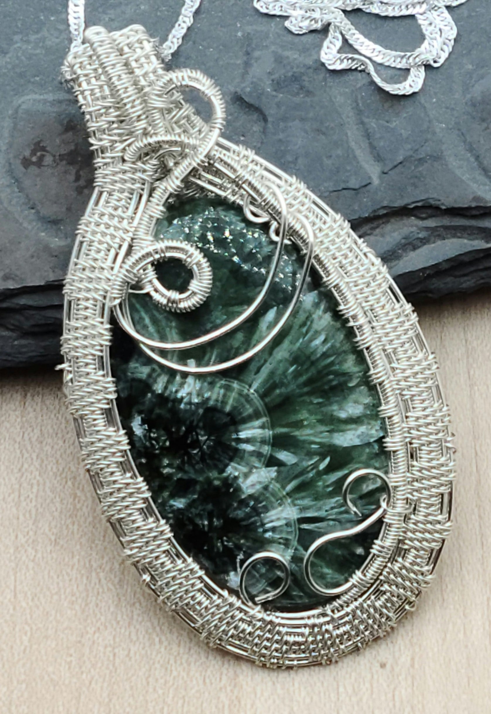Russian Seraphinite framed by woven argentium wire