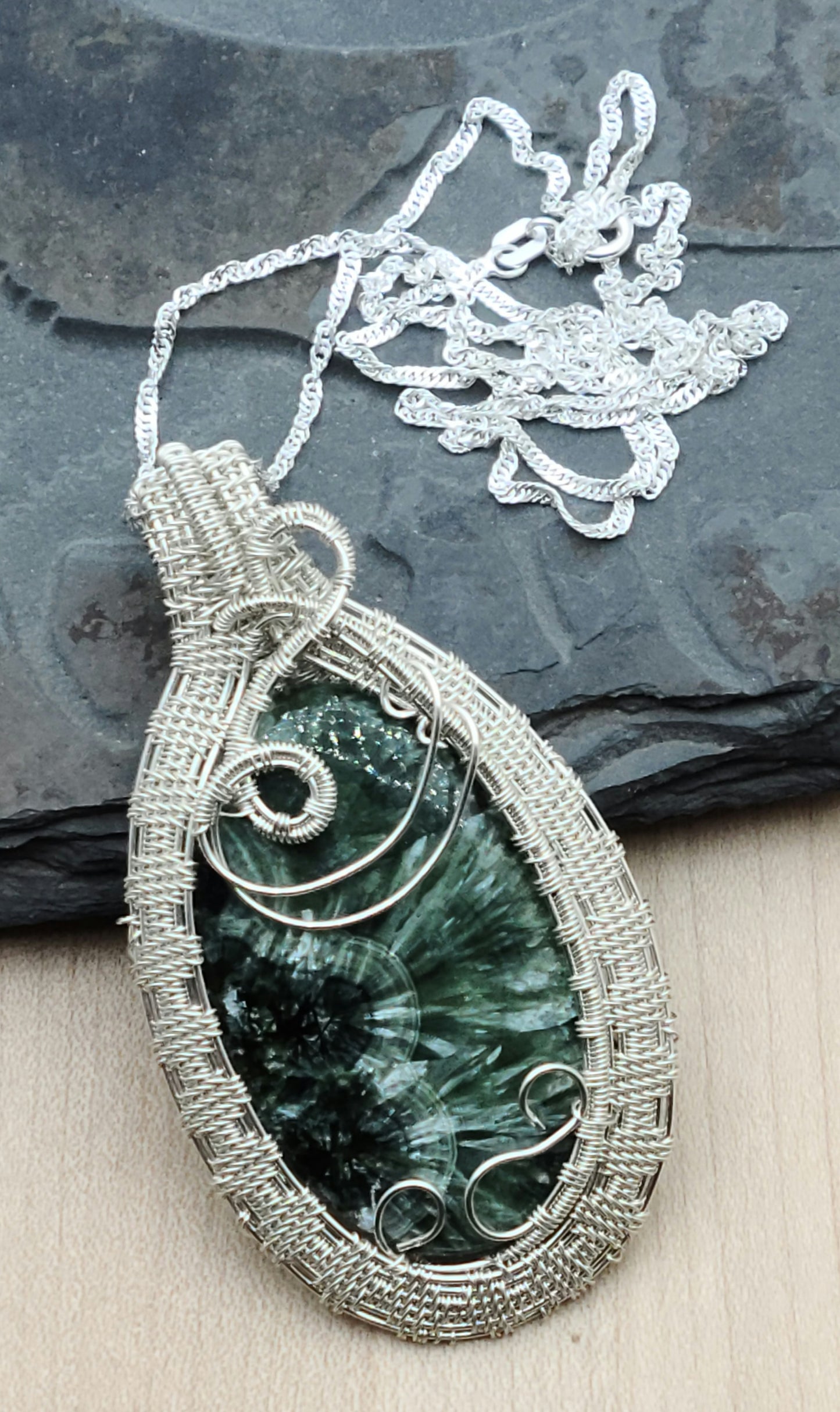 Russian Seraphinite framed by woven argentium wire