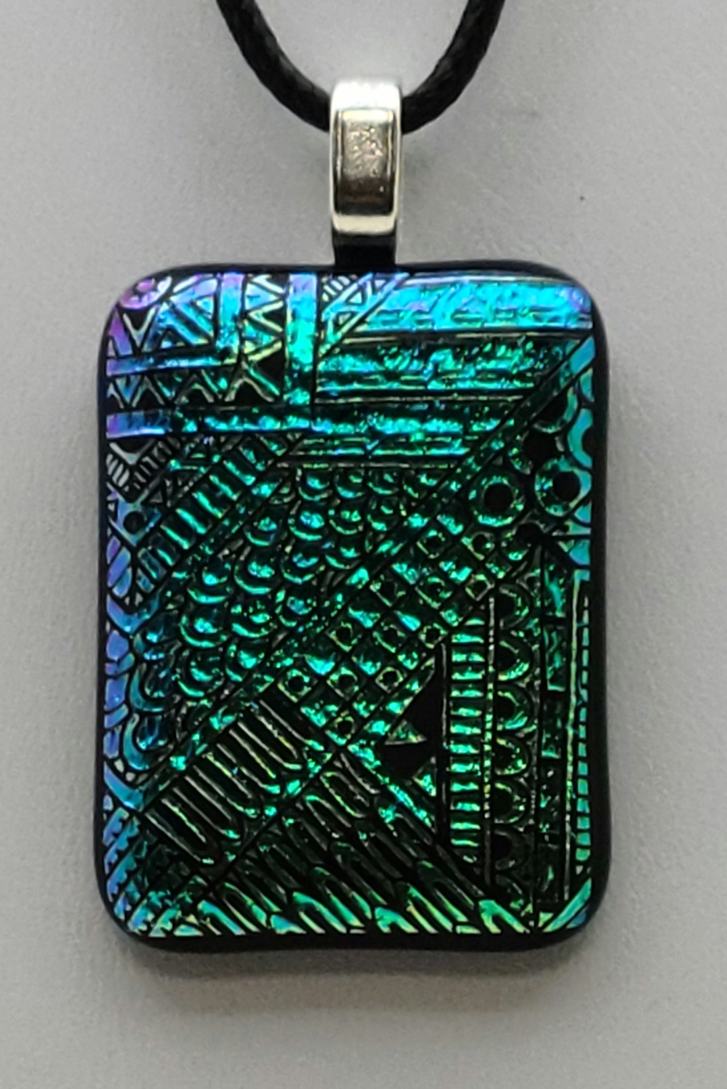 linear geometric designs in teal crinkle dichroic fused glass pendant