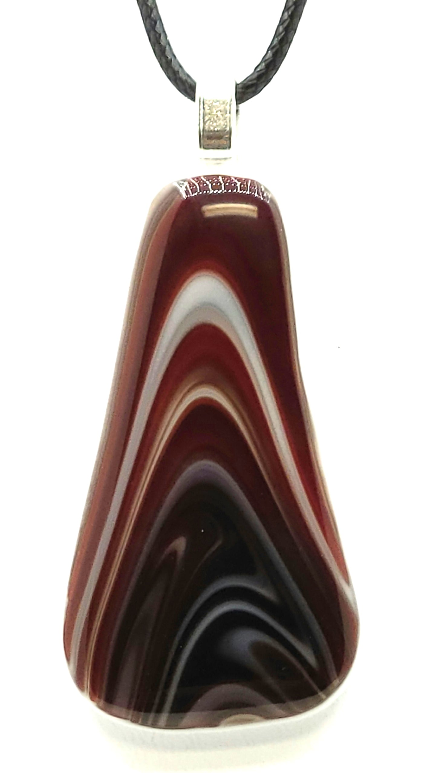 Swirls of deep red look like pulling taffy in this fused glass pedant.
