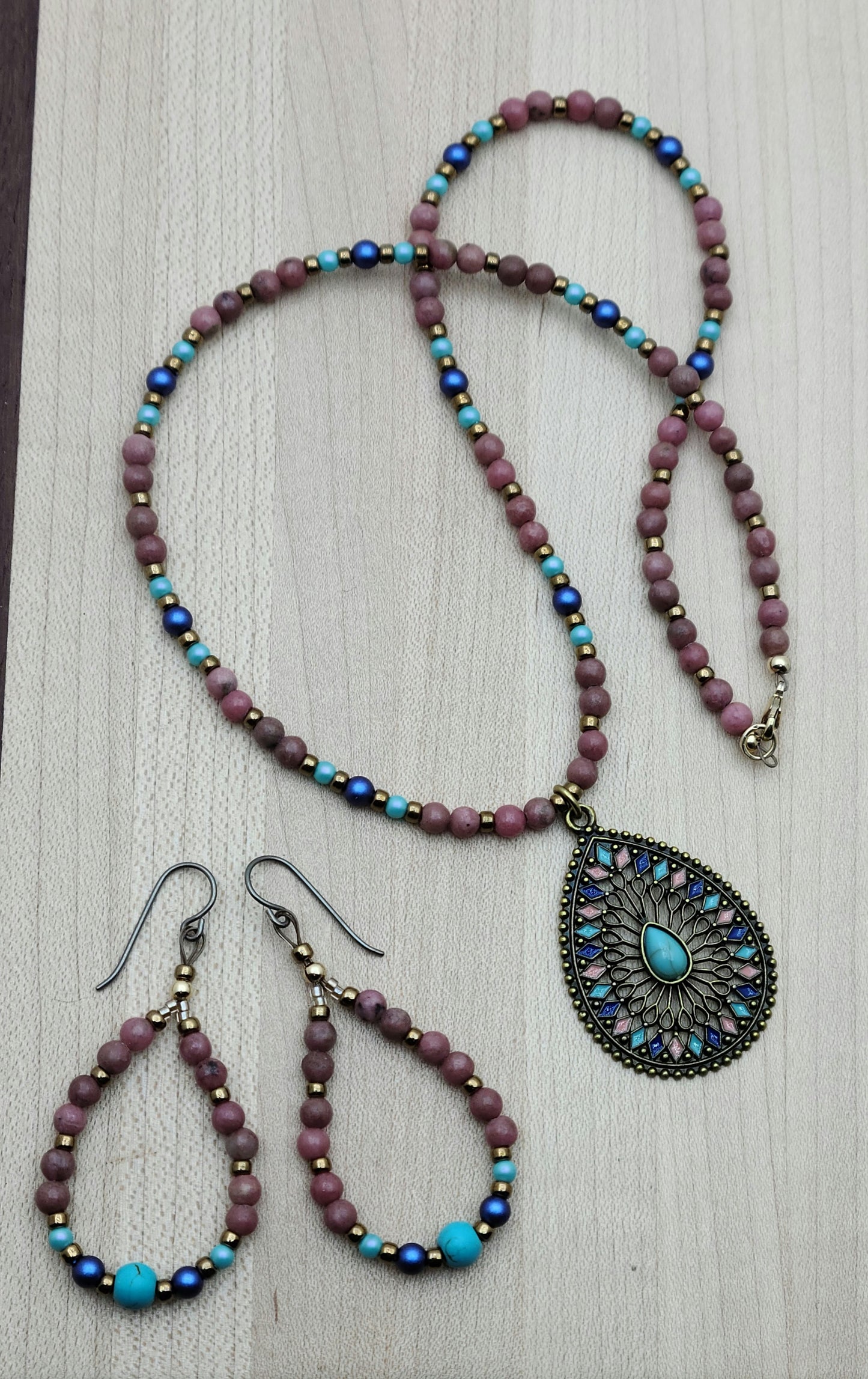 Brighten your day with this playful Pink/Blue/Turquoise Teardrop Necklace & Earrings set.