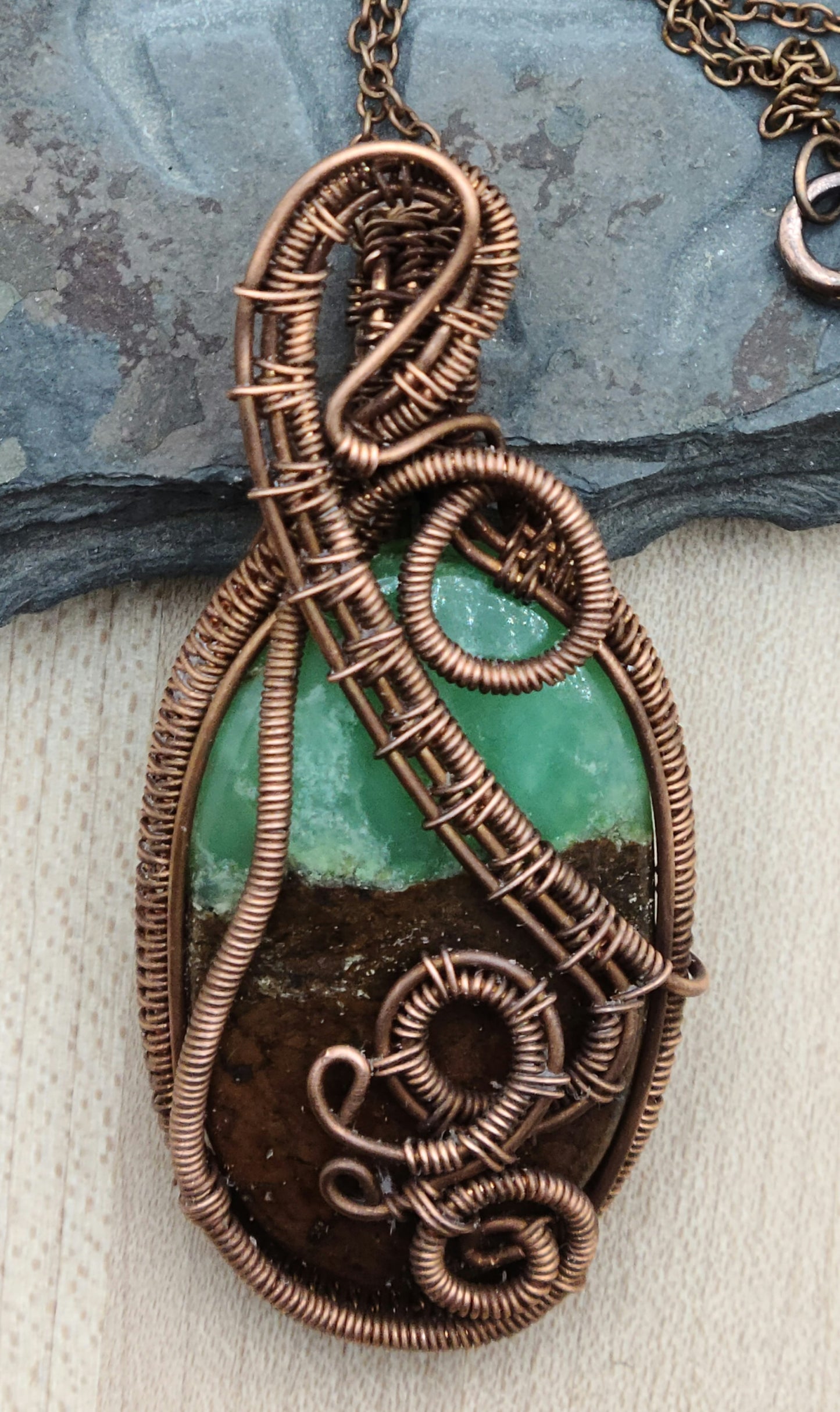 Antique Copper Woven Wire Framed Apple Green & Brown Bio Chrysoprase Oval Pendant