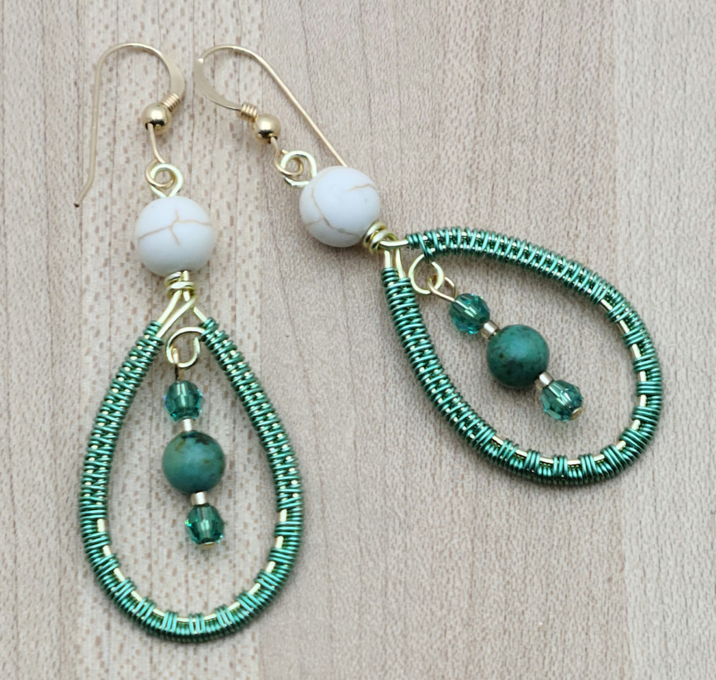 Woven Wire Sea Foam Earrings with turquoise crystal