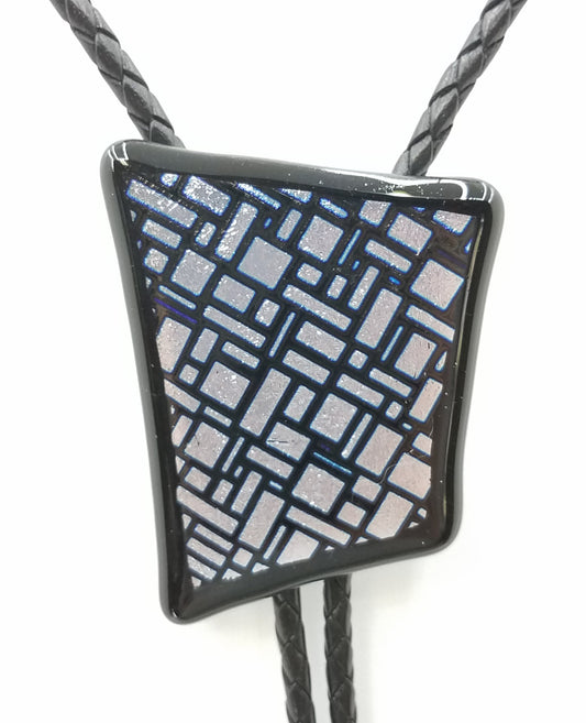 bolo tie of Silver & Black dichroic glass in an interesting geometric pattern backed by black glass