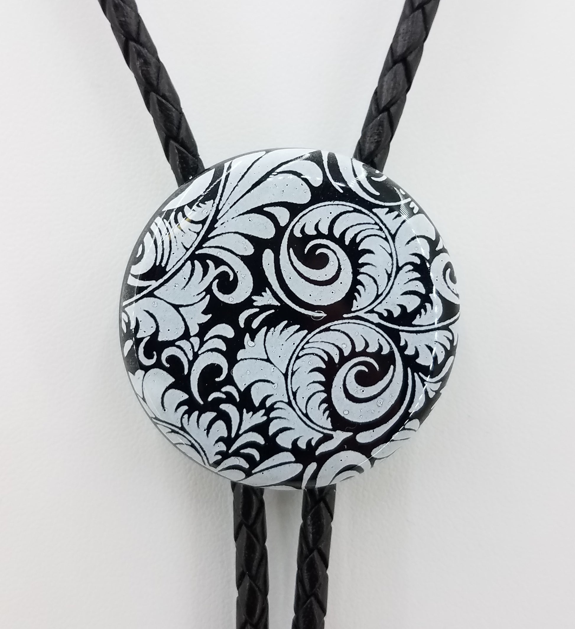 Bolo Tie - Black Disk w/White Flourish Fused Glass