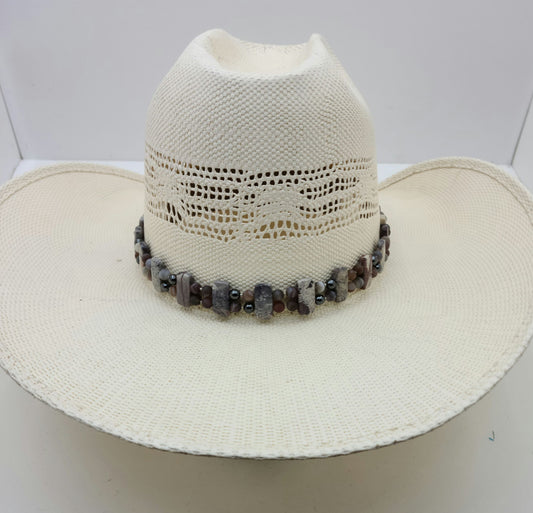 This hatband combines porcelain jasper, botswana agate, hematite, & leather! Adjustable by a leather slider knot.