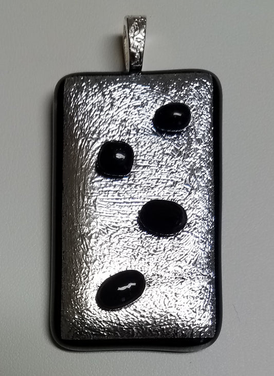 Black Pebbles of glass are tack fused to this silver crinkle dichroic.