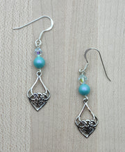 Iridescent turquoise and celtic heart earrigs