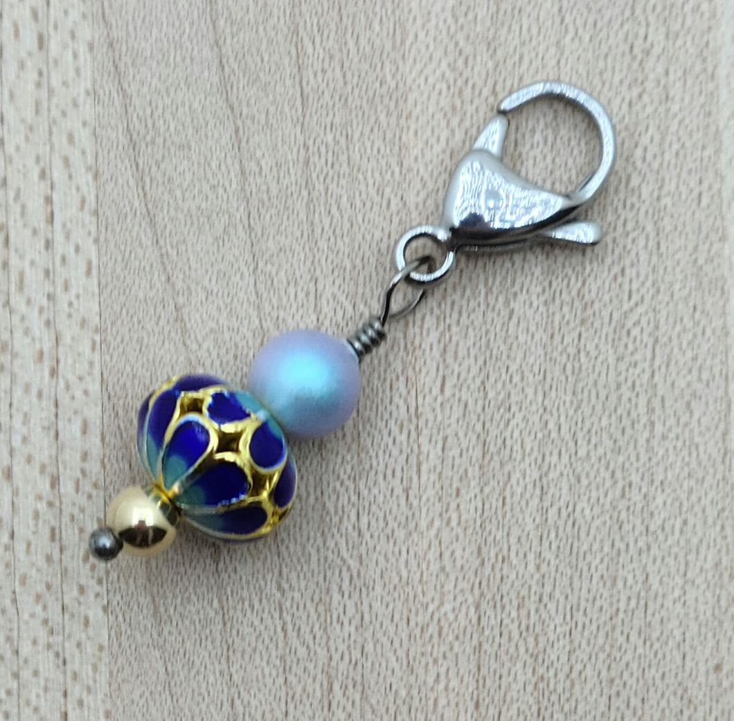 zipper pull features blue & gold cloisonne, crystal pearl*, gold fill & stainless steel