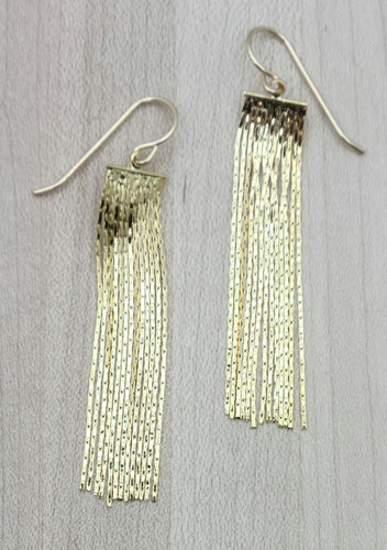 Tiny herringbone chain dangles create these fun gold plated earrings!