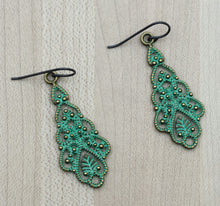 Patina green boho style earrings with niobium hypoallergenic fish hooks.