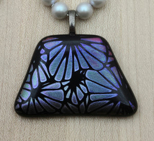 Tanzanite colored flowers in etched dichroic glass pendant