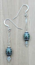 These beautiful tribal design etched crystal beads are set off with azure crystals* & liquid silver!  They're sure to garner attention when worn!  Fish hook earrings.