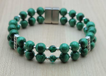 Malachite is such a lovely shade of green.  Emerald crystals add a deeper green.