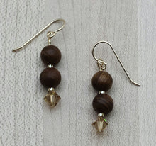 Rosewood is said to represent romantic love & sincere blessings. Paired with light light topaz crystals & gold, it is warm & inviting. gold fill fish hook earrings