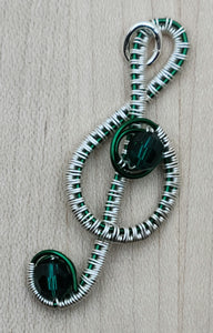 Woven Wire Green & Crystal Treble Clef Pendant