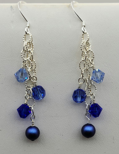 4 hues of blues - 3 crystal & 1 crystal pearl - dangle from textured sterling silver chain to create these beautiful earrings!