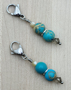 a cream colored crystal pearl*, a bali bead cap, turquoise imperial jasper, MOP,  crystal,