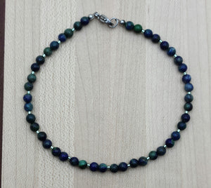 Dress up your ankle with a lovely, eye-catching anklet of stones comprised of blue azurite &amp; hints of green malachite!
