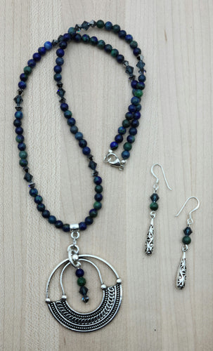 A large 'boho' silver pewter pendant hangs from blue & green azurite/malachite & is perfectly paired with chrome & Montana blue crystals!  + earrings