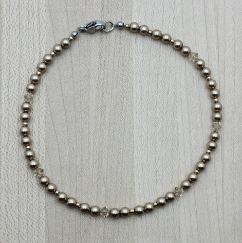 Dress up your ankle with an elegant, eye-catching anklet of bronze crystal pearls*, light silk crystals, & galvanized champagne Miyuki seed beads.