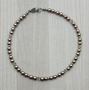 Dress up your ankle with an elegant, eye-catching anklet of bronze crystal pearls*, light silk crystals, &amp; galvanized champagne Miyuki seed beads.