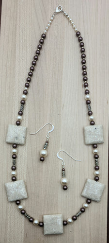 This necklace's focal beads are large river stone 