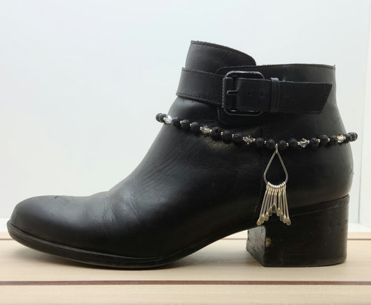 Every step will sparkle when you dress up your boots &amp; booties with the bling in this boot bracelet featuring a teardrop of silver paddles, black lava stone, galvanized Miyuki seed beads, &amp; silver shade crystals