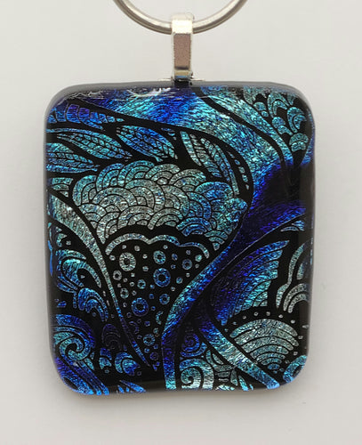 A distinctive, clear capped, cold worked silver & blue etched dichroic fused glass pendant statement piece!