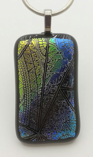 Church windows at dusk or dawn could look like this fused glass pendant!