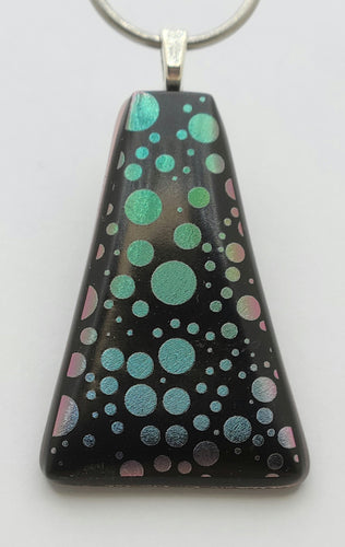 These fun dots resemble bubbles! Teal & mauve vie for the prominent color depending on the light's angle in this quirky etched dichroic fused glass pendant.