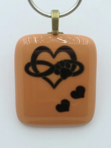 An infinity of canine/feline love is represented in this clay colored fused glass pendant!