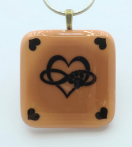 This fused glass pendant expresses lots of love for our canine/feline companions!