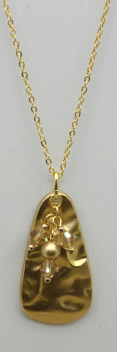 Gold hammered teardrop, crystals, & crystal pearl necklace