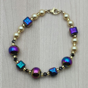 Add a touch of whimsy to any outfit with our electroplated hematite Rainbow Bracelet