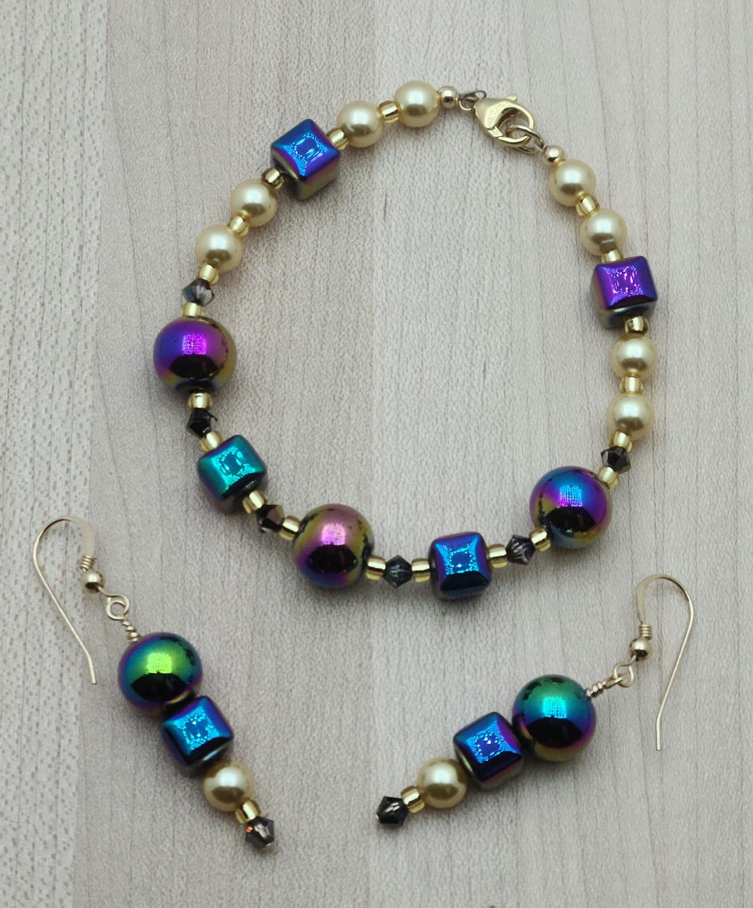 Add a touch of whimsy to any outfit with our electroplated hematite Rainbow Bracelet & Earrings.