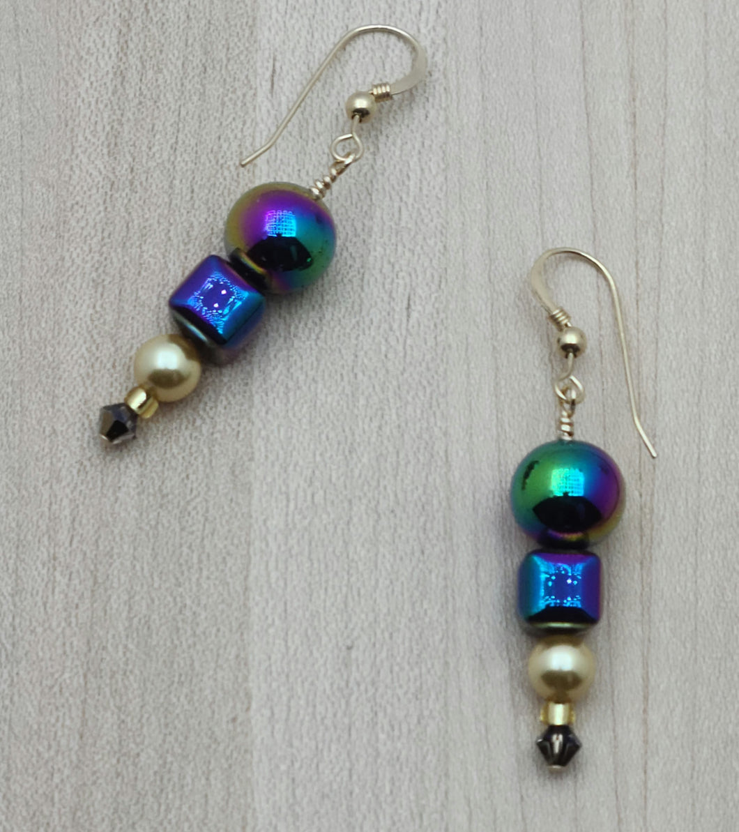 Add a touch of whimsy to any outfit with our electroplated hematite Rainbow Earrings.