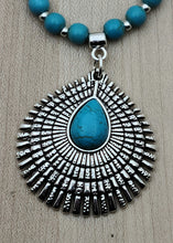 Pewter pendant with turquoise howlite teardrop center