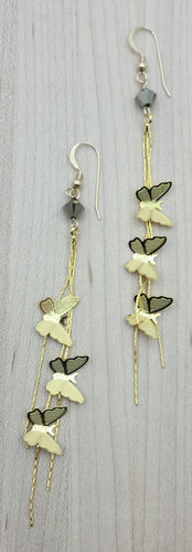 Gold fluttering butterfly tassel earrings