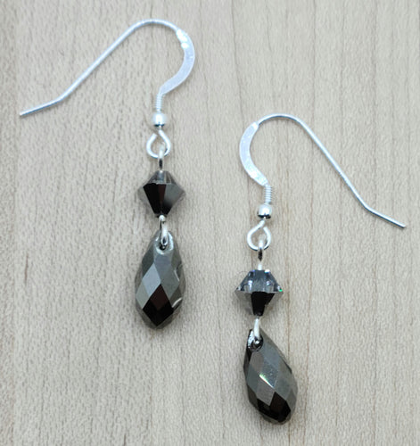 Indulge in the elegant simplicity of my Silver Night Dangle Briolette Earrings. 