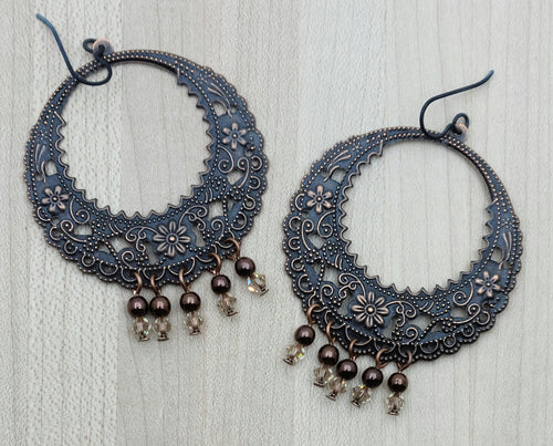 Add some fancy flair to your wardrobe with these lightweight copper hoop & crystal dangles earrings.