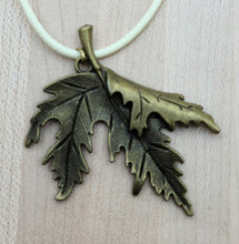 A brass folded leaf pendant is perfect for Fall!