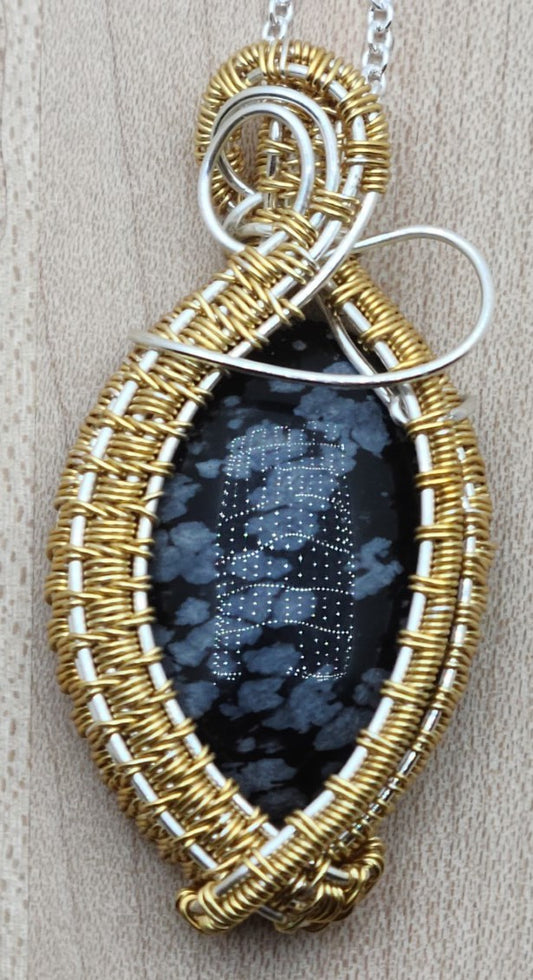 silver and gold framed snowflake obsidian woven wire pendant