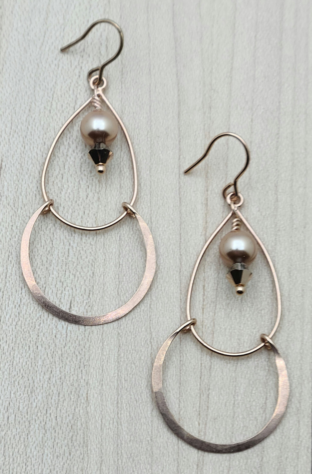 You'll love having these rose gold , crystal, & crystal pearl earrings, which are awesomely delicate, unique, and lightweight.